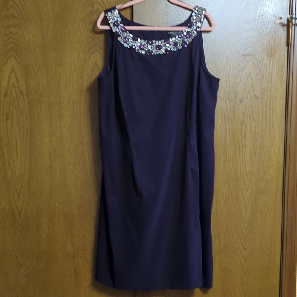 Chic Sleeveless Dress with Embellished Neckline